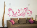 Wandtattoo Geschwungenes Ornament im Wohnzimmer in pink