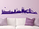 Panorama Kln als stylisches Wandtattoo in violett ber der Couch